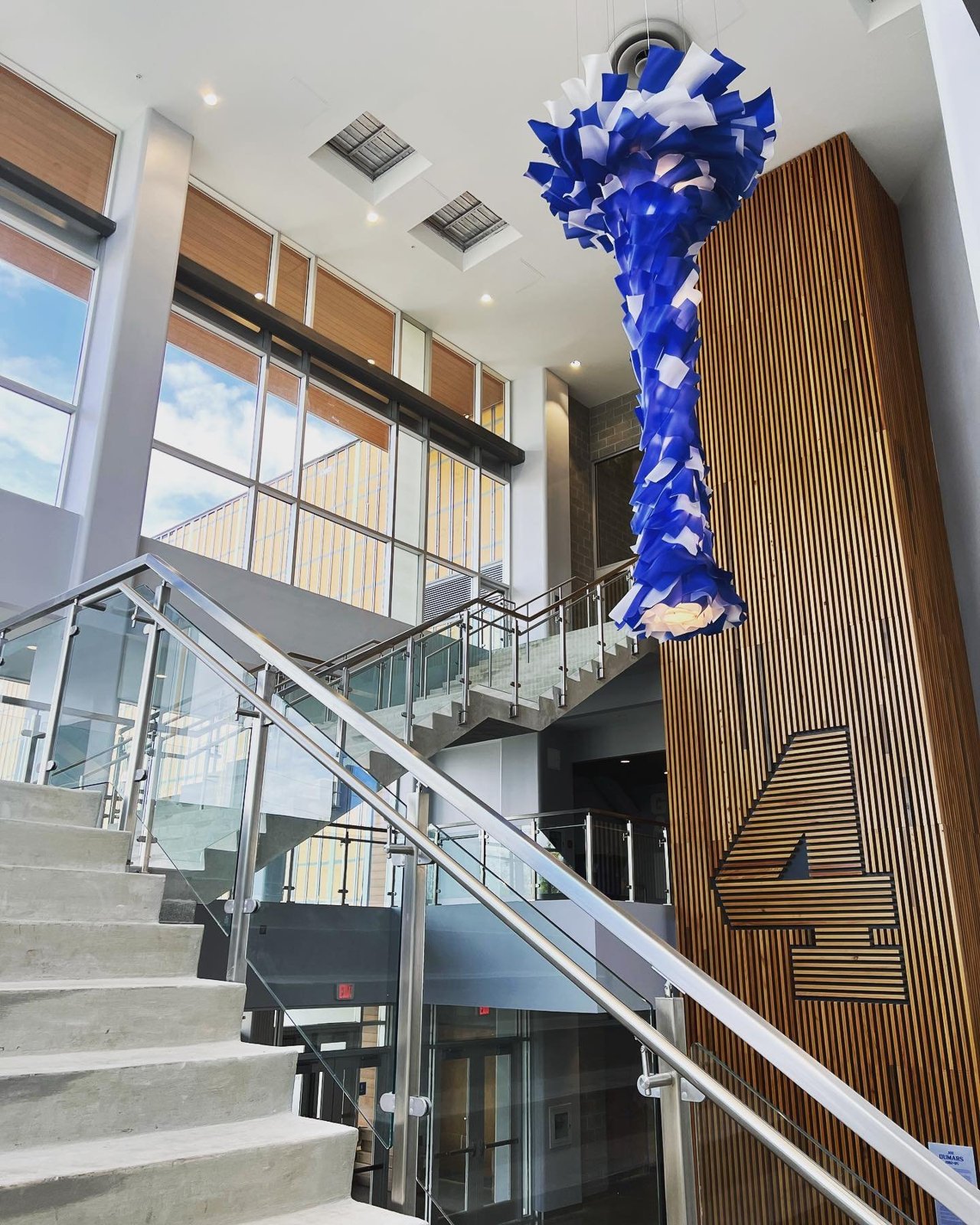 Grand Stair — Suspended Sculpture & Wood-Slat Feature Wall